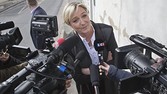 France's far right National Front leader Marine Le Pen, speaks to the media outside the party headquarters in Nanterre, west of Paris, Monday March 24, 2014. France's far-right National Front has conquered a symbolic northern town in Sunday's first round of municipal elections and led in some other cities, drawing calls by the governing left and rival right to stop the anti-immigration party's advance. The second round of municipal elections takes part on March 30 throughout France. (AP Photo/Michel Euler)