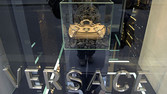 The exterior of a Versace boutique is seen in Milan, Italy, Wednesday, March 22, 2006. Gianni Versace SpA, the Italian fashion house named after its founder, may sell shares to fund expansion rather than link up with luxury-goods companies or a buyout firm, Creative Director and owner Donatella Versace said. Photographer: Giuseppe Aresu/Bloomberg News