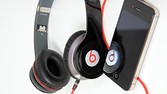 Beats by Dr. Dre Solo HD with Apple iPhone on white background