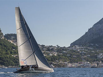 ROBERTISSIMA III (GBR) approaching Capri to finish the Volcano Race of the Rolex Capri Sailing Week