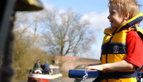 Little boy enjoying boat trip