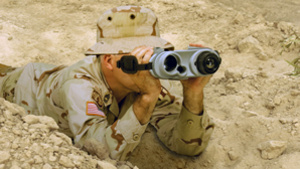 Soldier using LTLM on the beach