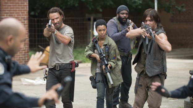 Still of Norman Reedus, Andrew Lincoln, Sonequa Martin-Green and Chad Coleman in The Walking Dead (2010)