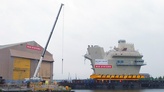 The Aft Island of HMS Queen Elizabeth loads out onto the Clyde