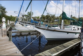 Sailboats berthed at boat slips and finger piers at the Jackson County Small Craft Harbor in Ocean Springs, Mississippi.