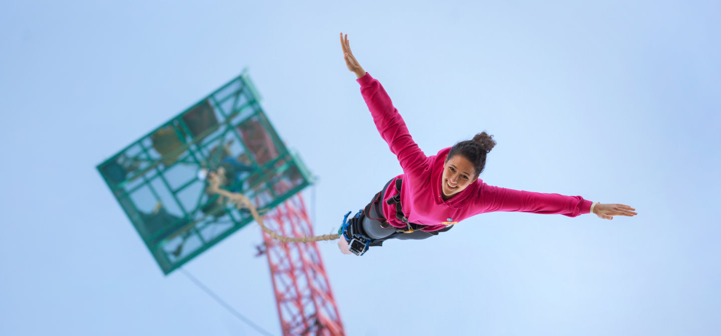 Girl bungee jumping