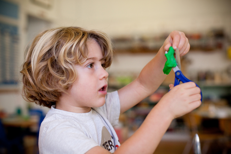 Child using play dough