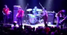 Blurry photo of the Get Up Kids onstage