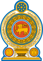 Coat of arms of Sri Lanka, showing a lion holding a sword in its right forepaw surrounded by a ring made from blue lotus petals which is placed on top of a grain vase sprouting rice grains to encircle it. A Dharmacakra is on the top while a sun and moon are at the bottom on each side of the vase.