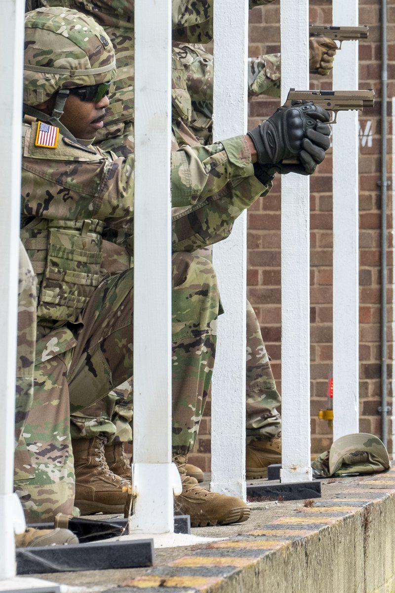 US Army soldiers train with the newly-issued ‘M17’ pistol on the firing ranges at their NATO base in Gloucester, South West England