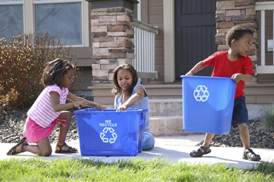 3 children holding Recycle bins - GreatNonprofits