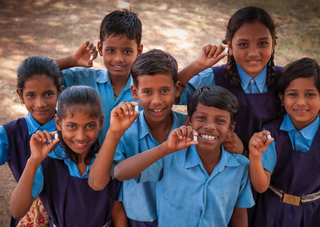 Group of children dressed in blue