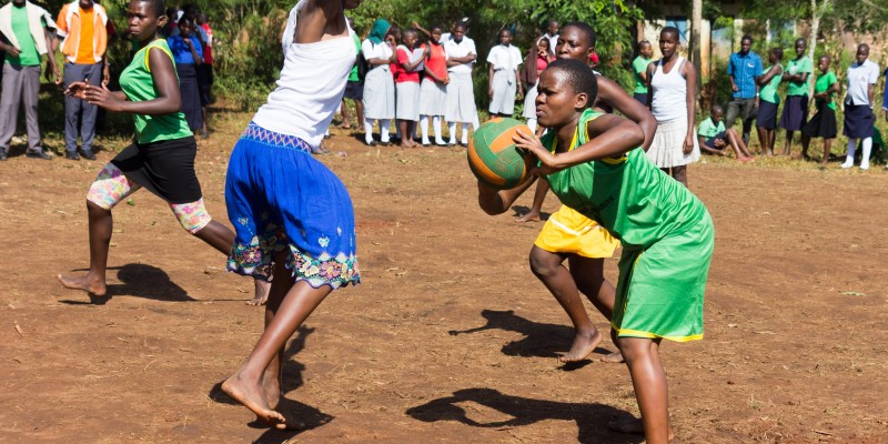 Young women play netball in Uganda, 2019. Credit: Adam Jan Figel/Shutterstock.com