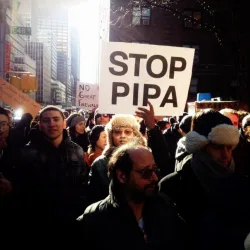 Protesters gather on 48th Street in Manhattan to speak against the SOPA and PIPA bills