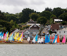 sailing club with lots of boats on the beach