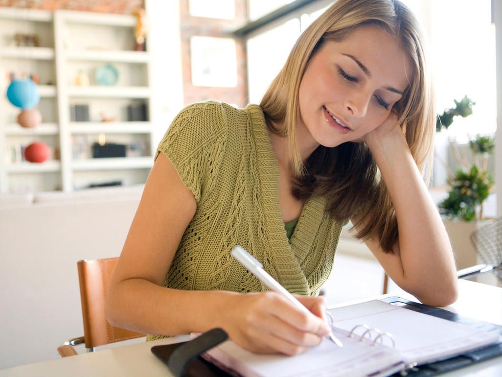 Woman checking her diary