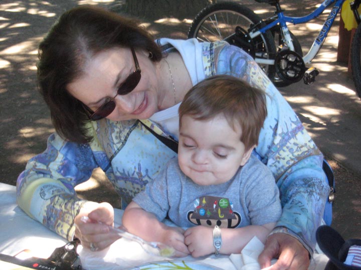 Photo of child and adult eating