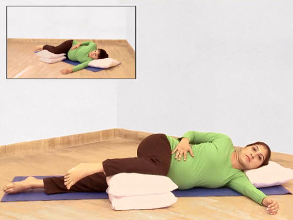 Pregnant woman in the relaxation yoga pose