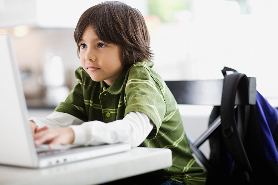 Elementary School Kid Working on Computer