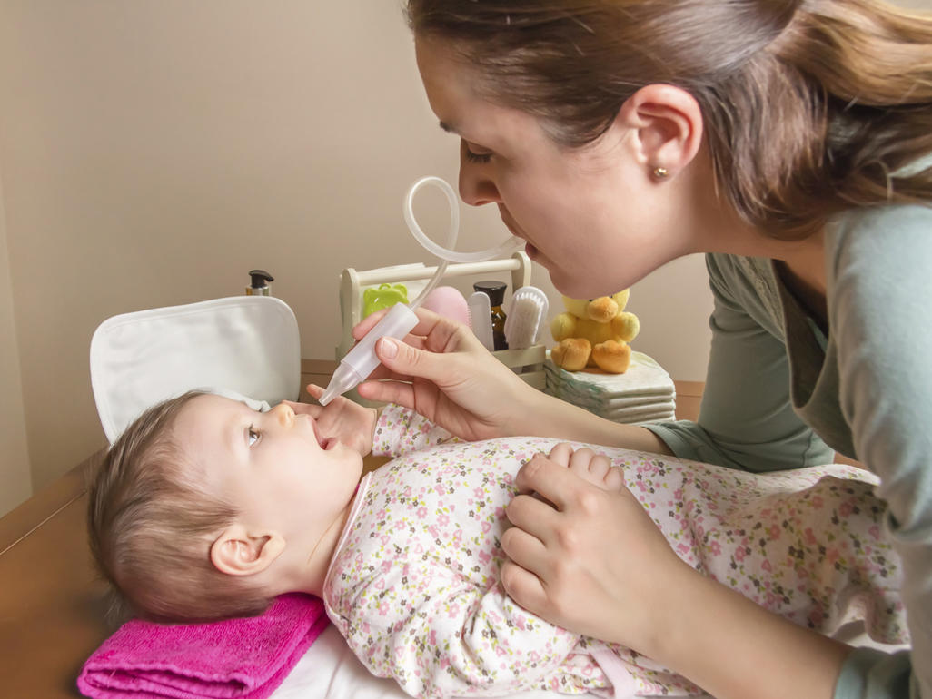 Bebé tomando medicina