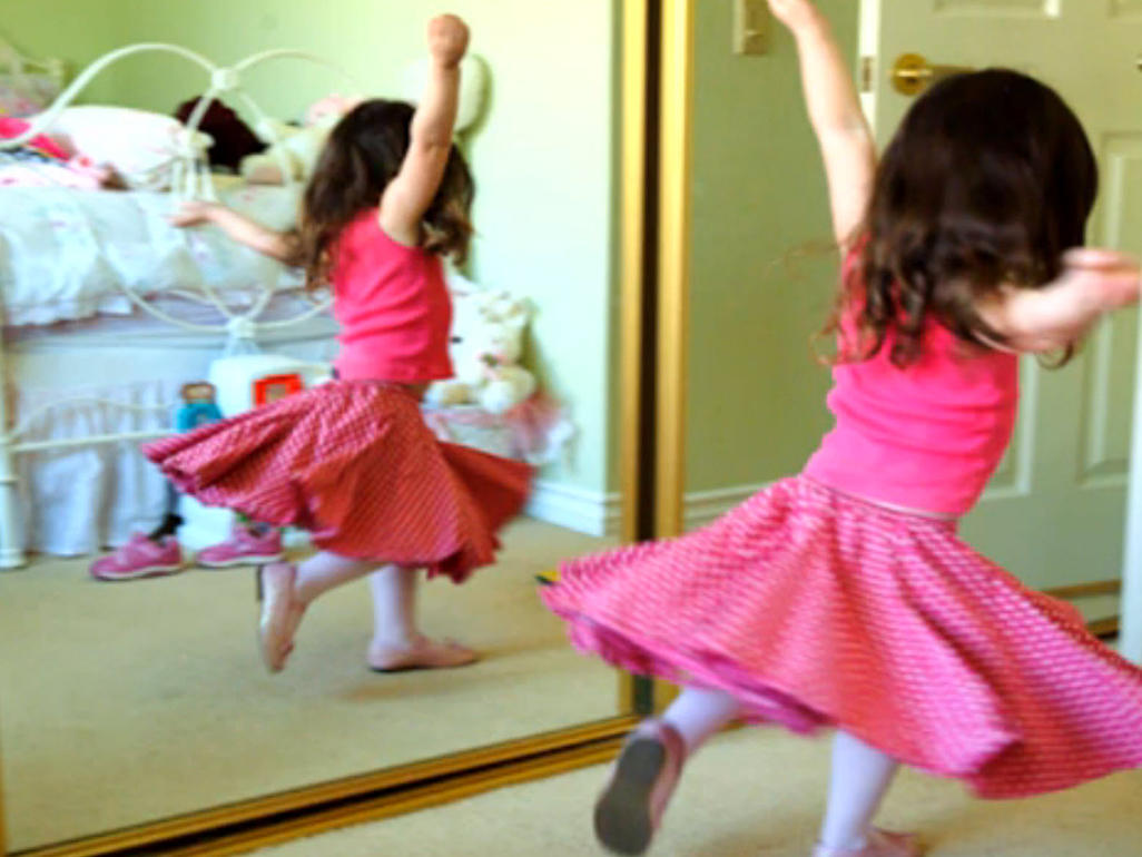 girl spinning and dancing