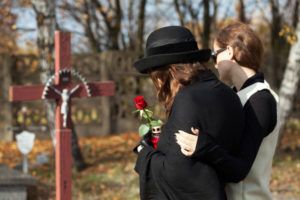 A family mourns the wrongful death of a loved one in an Atlanta cemetery. 