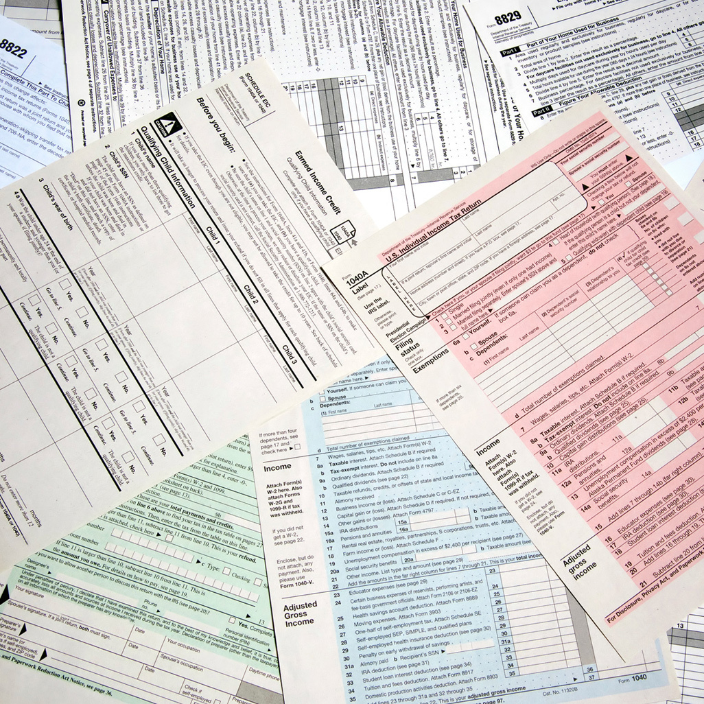 table full of tax forms