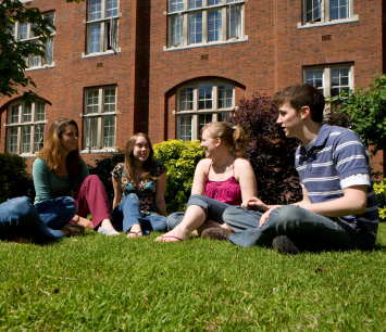 Students sitting at Beit Quadrangle