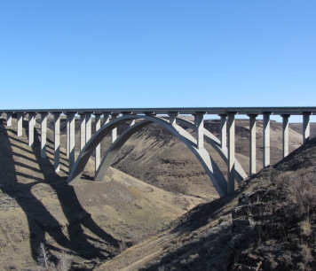 A concrete bridge over a valley