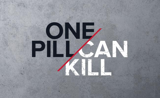 One Pill Can Kill distressed logo - grey and white concrete grunge background