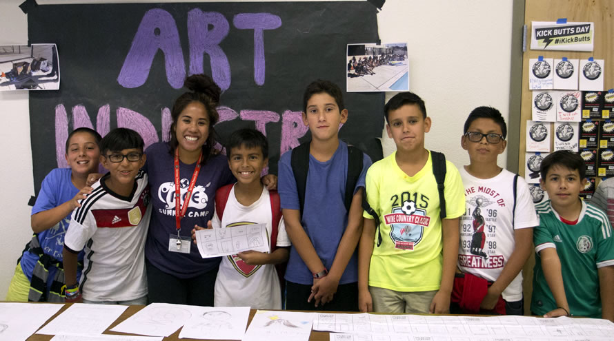 Group of Kids with Their Drawings