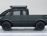 Canoo’s electric pickup truck has a flatbed size comparable to a traditional pickup truck,...