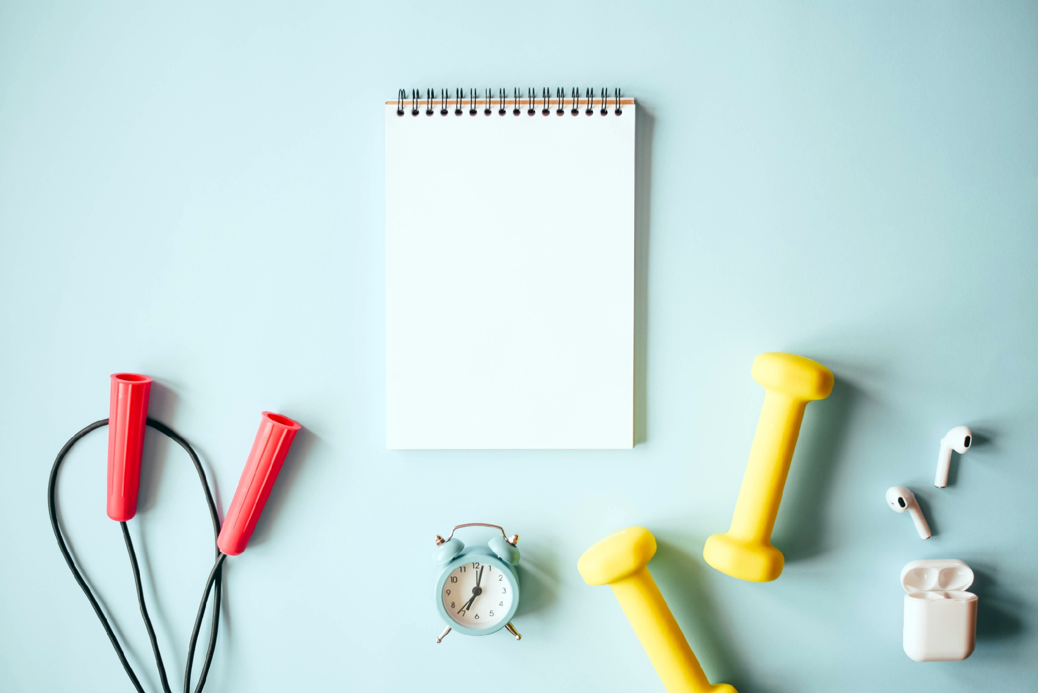 photo of notebook, gym equipment