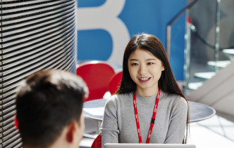 Students talking in the Business School cafe