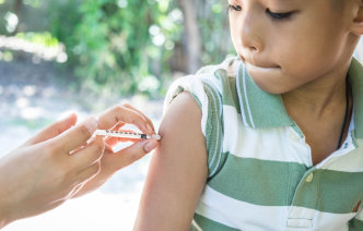 A child receiving an injection