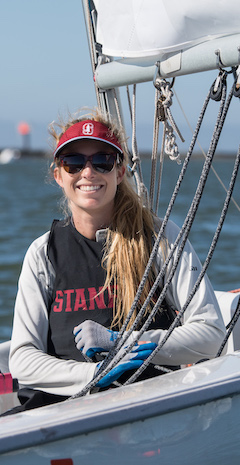 woman smiling in sailboat