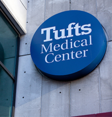 Tufts logo on the exterior of the building