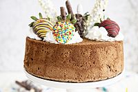 Chocolate angel food cake with various toppings.jpg