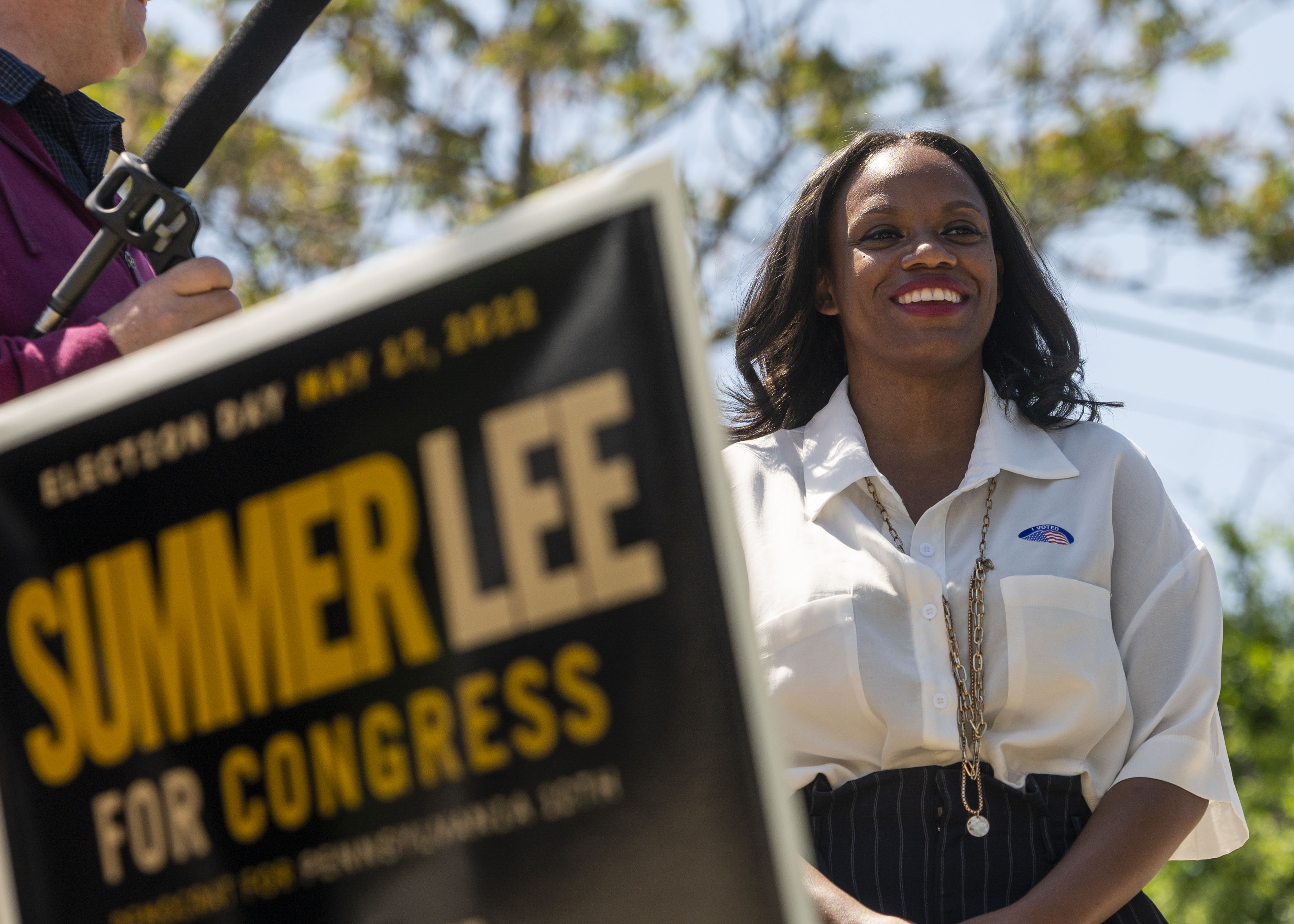 Pennsylvania state representative Summer Lee smiles in a photo at a campaign event.