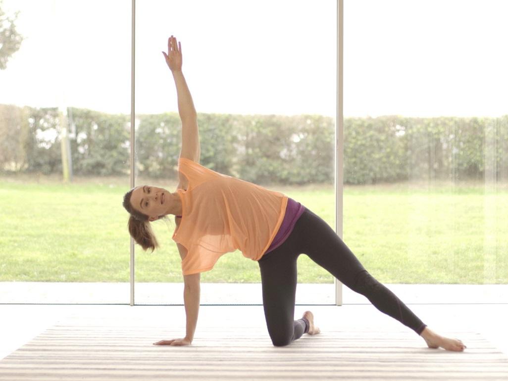 woman exercising and twisting