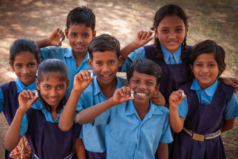 Group of children dressed in blue