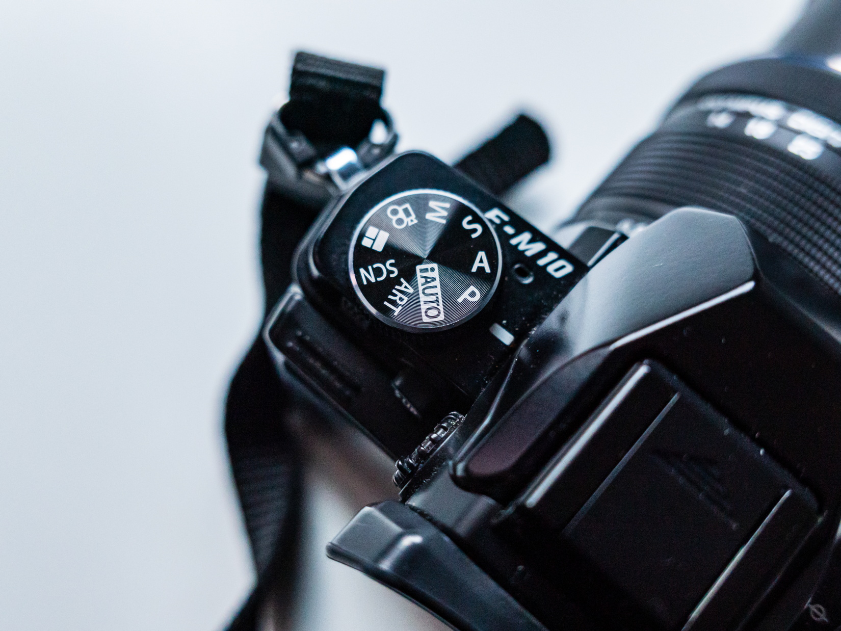 Black Mirrorless Camera on White Desk