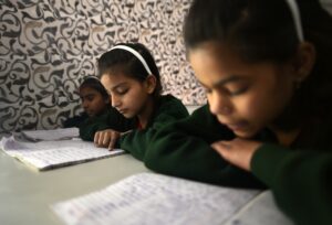 A girl reading a textbook