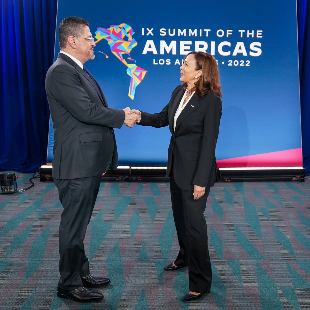 Vice President Harris speaking with President Rodrigo Chaves of Costa Rica at the Summit of the Americas.