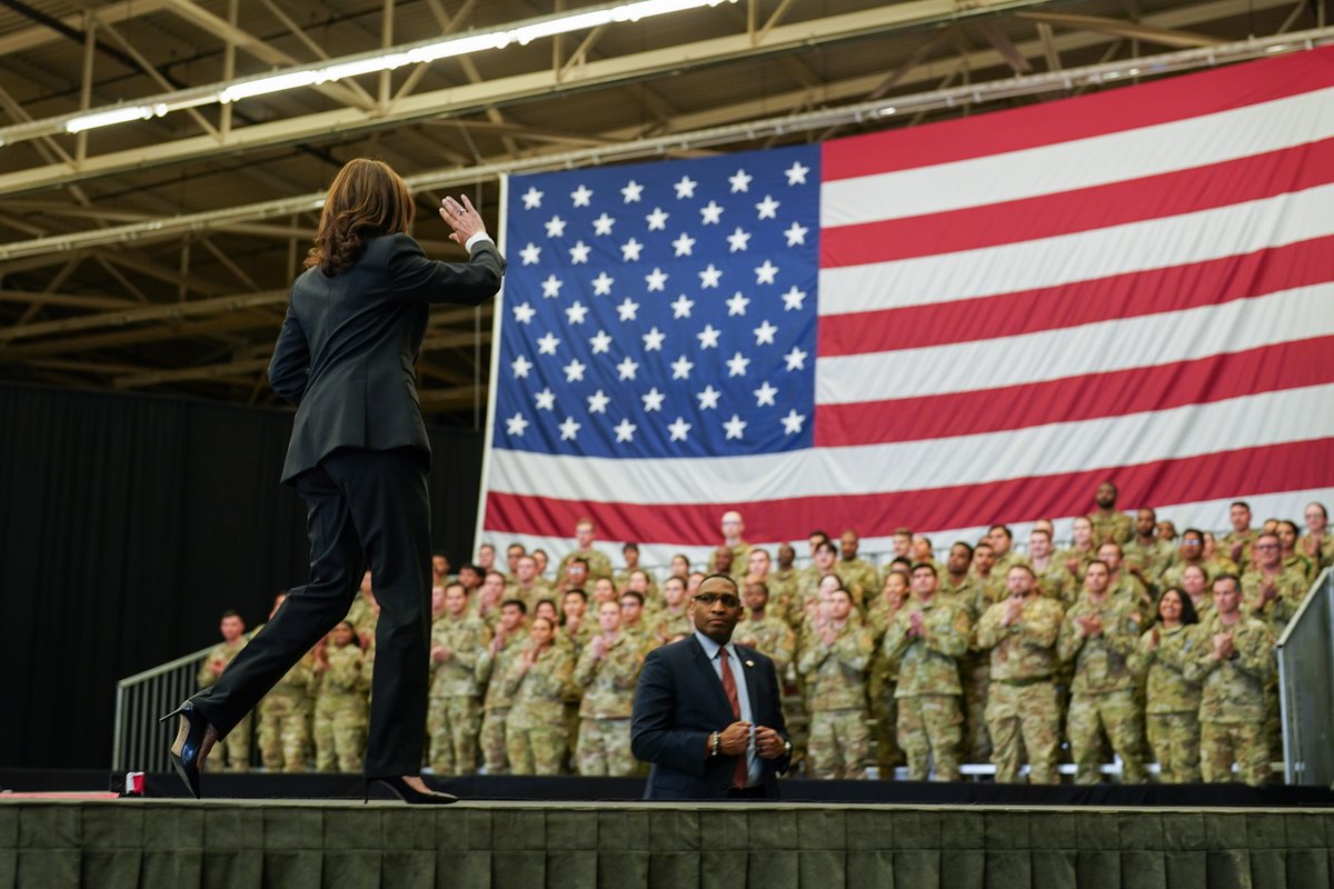 Vice President Harris waves goodbye to service members at Vandenberg Space Force Base.