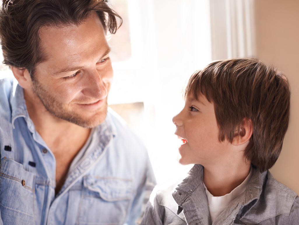 Dad talking with son