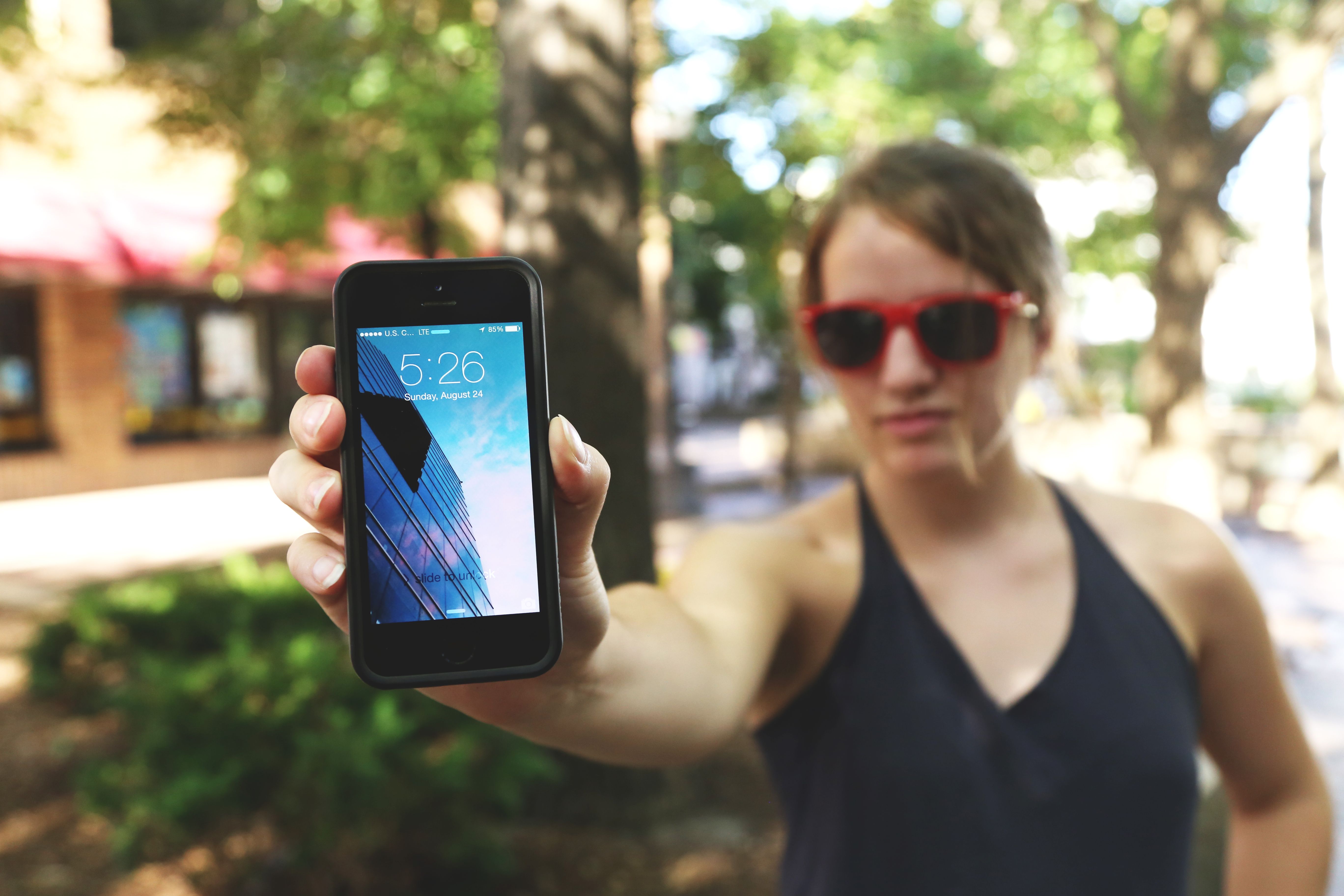 Woman Holding Cell Phone Free Stock Picture