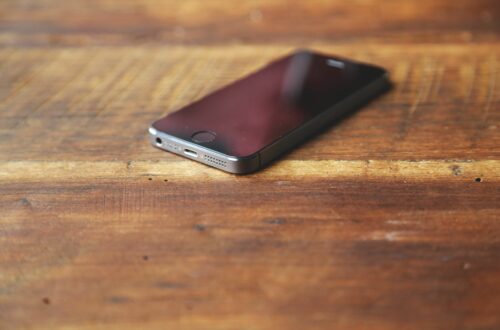 Cell Phone On Desk Free Stock Picture