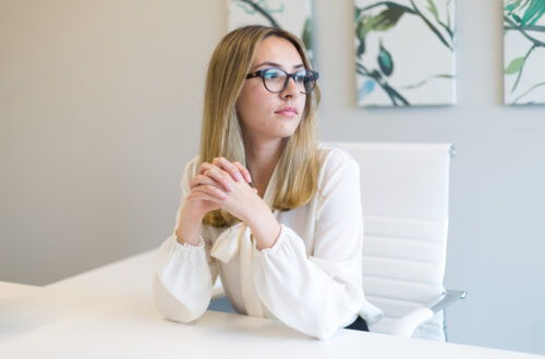 Woman Sitting At Desk Free Stock Picture