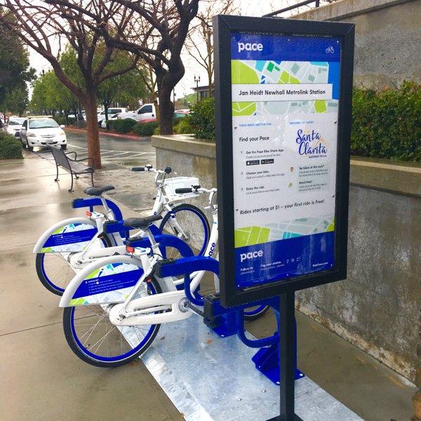 Bikes in rack at station